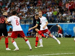Di tengah derap Kroasia, Ivan Rakitic kembali memperlihatkan sinarnya. Saat Kroasia menyingkirkan Denmark di 16 besar, Rakitic tampil menonjol di antara 102 sentuhan bola, 84% operan sukses, 2 operan kunci, selain juga membuat 2 intersep dan 2 tekel. (Foto: Jason Cairnduff/Reuters)
