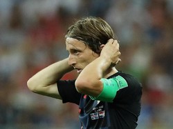 Luka Modric berperan besar dalam keberhasilan Kroasia menembus final pertamanya di Piala Dunia. Playmaker Kroasia ini melengkapi performa apiknya di lini tengah dengan 2 gol dan 1 assist. (Foto: Albert Gea/Reuters)