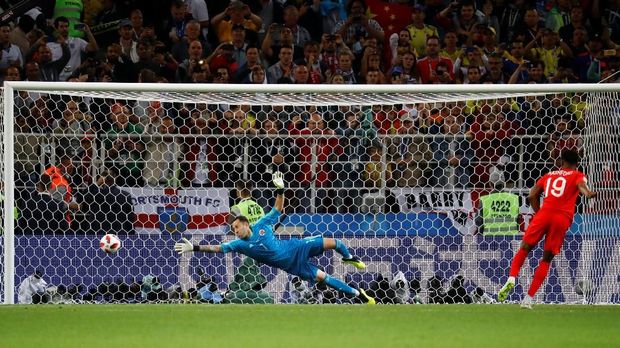 Marcus Rashford dianggap sukses meniru gaya eksekusi penalti Cristiano Ronaldo.
