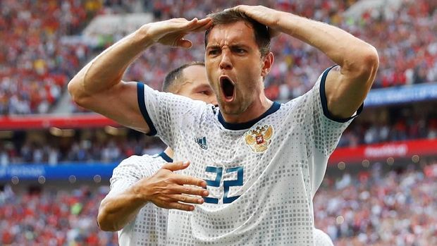 Artem Dzyuba merayakan gol ke gawang Spanyol di babak 16 besar Piala Dunia 2018.