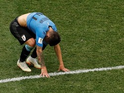 Lucas Torreira tertunduk di lapangan. REUTERS/Carlos Barria.