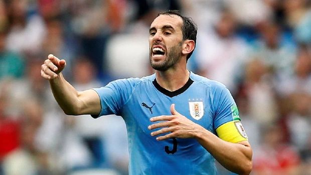Diego Godin membela kesalahan Fernando Muslera saat Uruguay dikalahkan Prancis.
