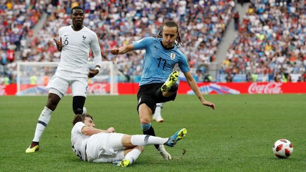 Uruguay kesulitan mencetak gol ke gawang Prancis.