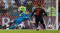 Mateo Kovacic menjadi satu-satunya pemain Kroasia yang gagal mengeksekusi penalti. (Foto: Kai Pfaffenbach/Reuters)