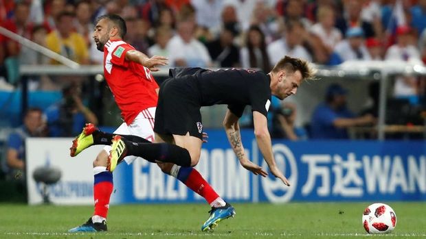 Ivan Rakitic sangat baik menjaga lini tengah Kroasia. (