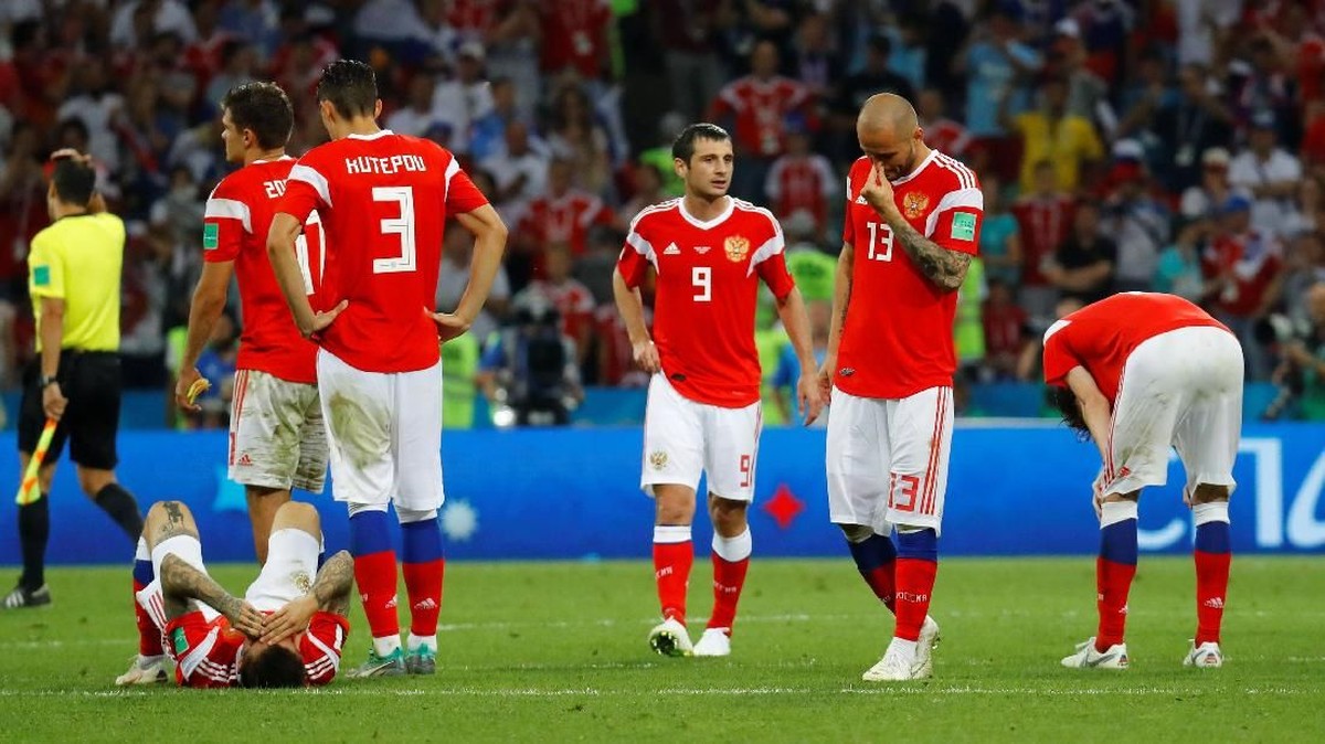 Kekecewaan Rusia setelah kalah adu penalti dari Kroasia (Foto: Kai Pfaffenbach/Reuters)