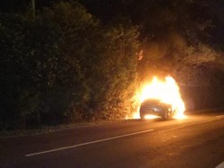 Mobil Sedan Terbakar di Exit Tol UKI