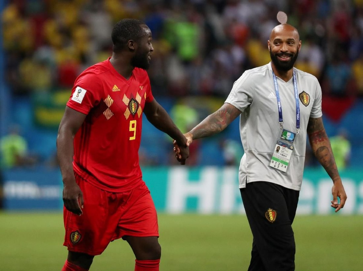Thierry Henry bersama Romelu Lukaku ( REUTERS/Sergio Perez)