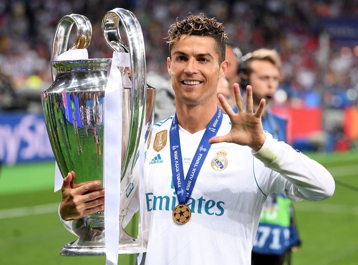 KIEV, UKRAINE - MAY 26:  Cristiano Ronaldo of Real Madrid poses with the UEFA Champions League trophy following the UEFA Champions League Final between Real Madrid and Liverpool at NSC Olimpiyskiy Stadium on May 26, 2018 in Kiev, Ukraine.  (Photo by Laurence Griffiths/Getty Images)