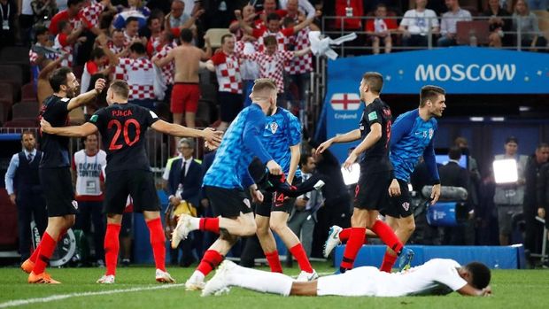 Marcus Rashford tergeletak di lapangan meratapi kekalahan timnya dari Kroasia.