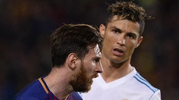 Dua rival abadi, Cristiano Ronaldo dan Lionel Messi.