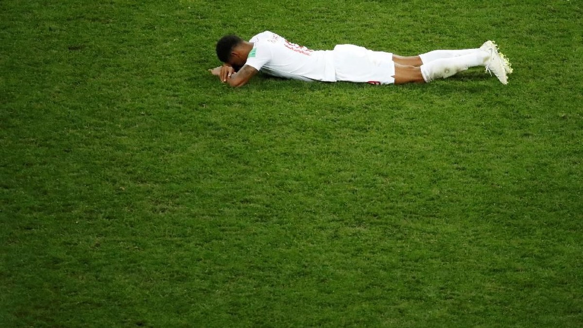 Kekecewaan penyerang Inggris Marcus Rashford setelah timnya kalah dari Kroasia di semifinal Piala Dunia 2018 (Foto: Christian Hartmann/Reuters)