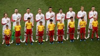 Kroasia menurunkan Subasic, Vrsaljko, Lovren, Vida, Strinic, Rebic, Rakitic, Brozovic, Perisic, Modric, dan Mandzukic. Reuters/Christian Hartmann.