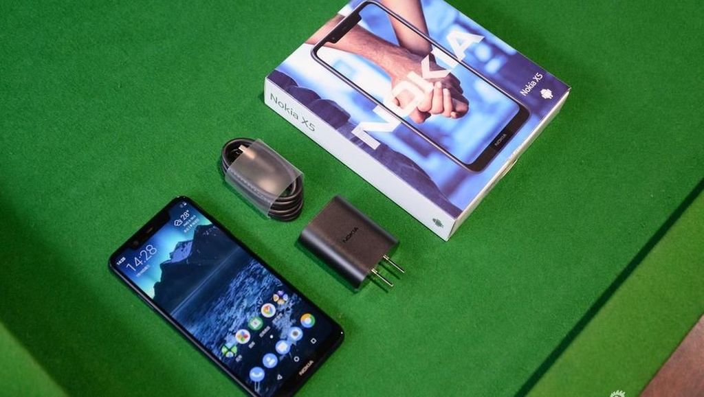 Penampakan Jeroan Nokia X5 Ketika Dipreteli Penampakan Jeroan Nokia X5 Ketika Dipreteli