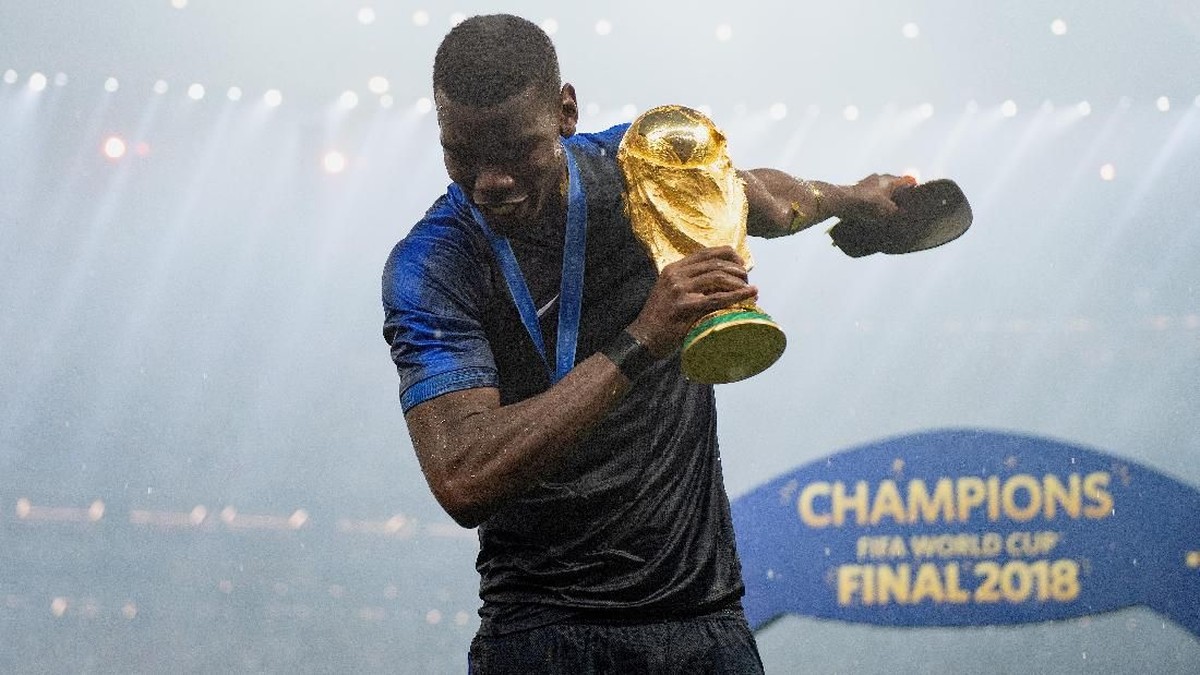 Paul Pogba saat juara Piala Dunia 2018. (Foto: Matthias Hangst/Getty Images)