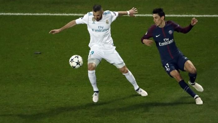 Karim Benzema dan Angel Di Maria. (Foto: Thomas Samson/AFP) Karim Benzema dan Angel Di Maria. (Foto: Thomas Samson/AFP)