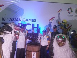 Di Bondowoso, Kirab Obor Asian Games 2018 Disambut Hujan Deras