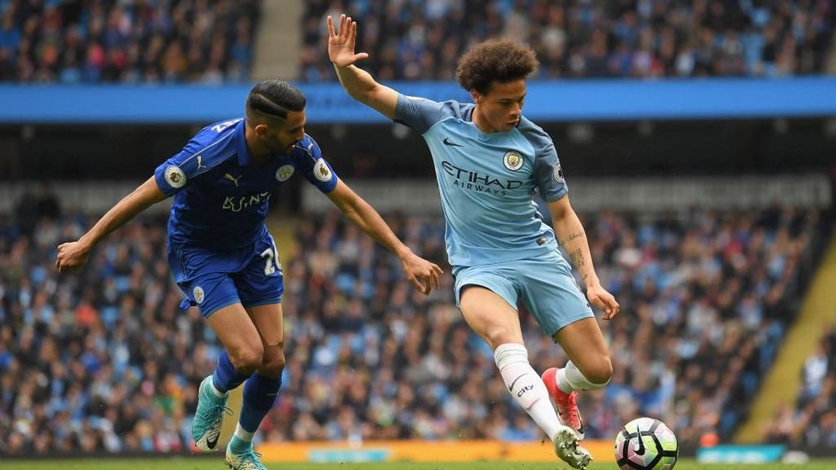 Leroy Sane senang kini satu tim dengan Riyad Mahrez (Foto: Laurence Griffiths/Getty Images)