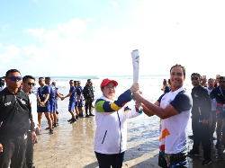 Menko PMK Bawa Api Obor Ke-20 Asian Games 2018 di Bali