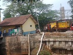 Sinergi Pemerintah Pusat dan DKI Atasi Bau Kali Item