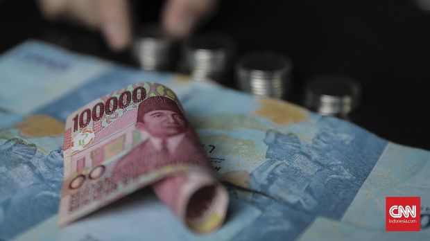 ilustrasi rupiah, Jakarta (25/7). (CNN Indonesia/ Hesti Rika)