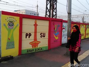 Foto: Warna-warni Mural Asian Games Pasukan Oranye di Jatinegara