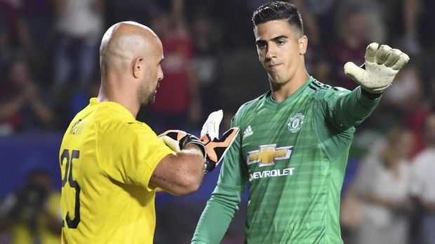 MU menang adu penalti lawan AC Milan.