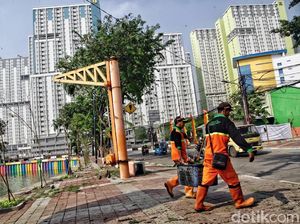 Melihat Aksi Petugas Oranye Bersihkan Danau Sunter Melihat Aksi Petugas Oranye Bersihkan Danau Sunter