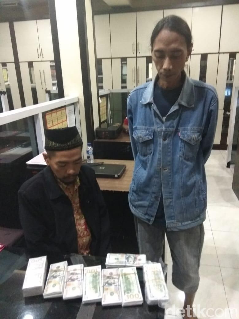 Polisi Tangkap Pengedar Dolar AS Palsu Senilai Rp 1,8 Miliar