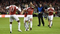 Kendati cuma laga pramusim, para pemain Arsenal menikmati dan merayakan kemenangan ini. (Foto: Charles McQuillan/Getty Images)