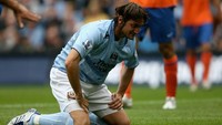 Manchester City pernah punya striker Italia bernama Rolando Bianchi. Didatangkan dari Torino dengan harga 7,7 juta pound sterling pada 2007, Bianchi cuma setahun di City setelah bikin empat gol dari 19 laga dan dijual balik ke Torino dengan harga 4 juta pound. (Clive Brunskill/Getty Image)