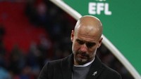 City menjuarai Piala Liga Inggris berkat kemenangan 3-0 atas Arsenal di final. Ini membuahkan trofi pertama Guardiola di City, yang ia tangani semenjak 1 Juli 2016. (Foto: Catherine Ivill/Getty Images)