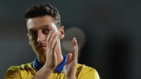 Mesut Oezil didatangkan Arsenal di hari terahir bursa transfer musim panas 2013, setelah ditebus 42 juta pound sterling dari Real Madrid. (Foto: Jamie McDonald/Getty Images)