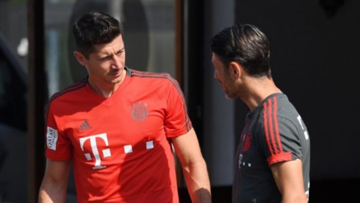 Robert Lewandowski akan bertahan di Bayern Munich. (Foto: Christof Stache/AFP Photo)