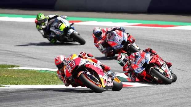 Marc Marquez terlibat pertarungan sengit dengan duo Ducati di MotoGP Austria.