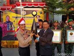 Polres Ini Raih Prestasi Dunia Bentangkan Merah Putih di Atas Waduk