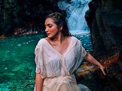 Merinding! Heboh Ada Wajah di Balik Foto Cantik Ashanty
