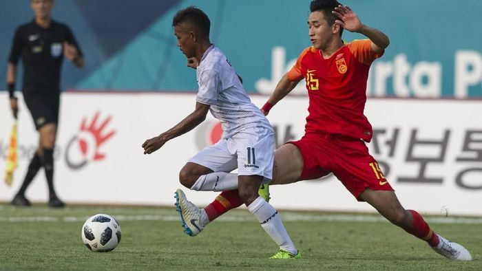 Timnas China (merah) menang 6-0 atas Timor Leste di laga perdana Grup C Asian Games 2018. (Foto: Novrian Arbi/INASGOC/ANTARA PHOTO) Timnas China (merah) menang 6-0 atas Timor Leste di laga perdana Grup C Asian Games 2018. (Foto: Novrian Arbi/INASGOC/ANTARA PHOTO)