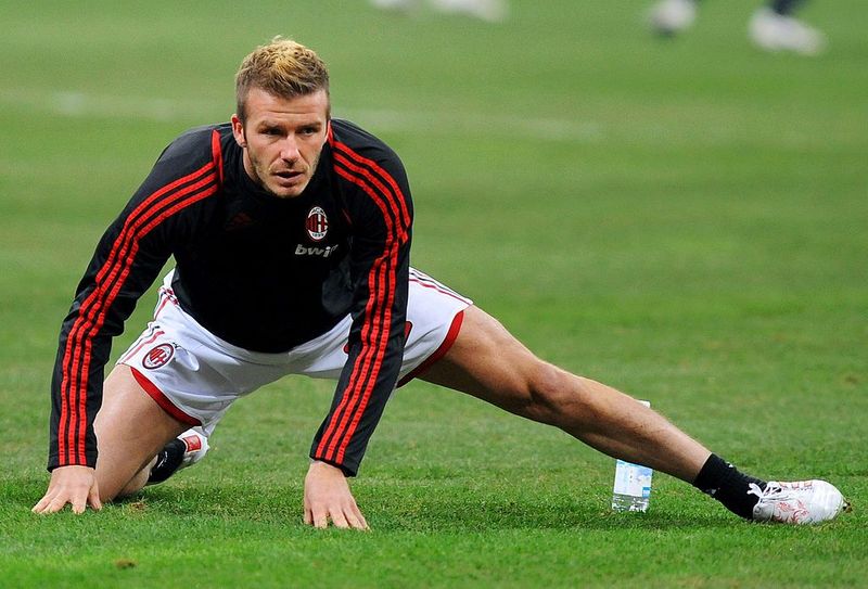 MILAN, ITALY - JANUARY 06:  David Beckham of AC Milan warms up before the Serie A match between AC Milan and Genoa CFC at Stadio Giuseppe Meazza on January 6, 2010 in Milan, Italy.  (Photo by Massimo Cebrelli/Getty Images)