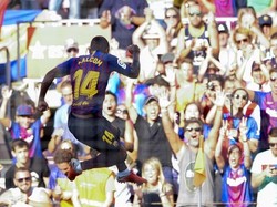 Malcom membuka keunggulan Barcelona di menit ke-14. Menerima umpan Lionel Messi di sisi kiri, Malcom melepaskan sepakan mendatar yang bersarang di sudut bawah gawang Boca. Barca pun memimpin 1-0. (Foto: Josep Lago/AFP Photo)