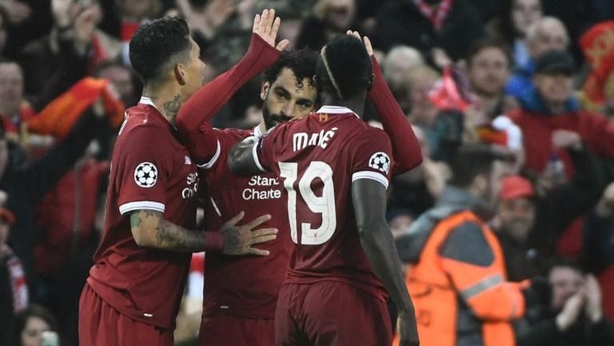 Mohamed Salah dan Sadio Mane di salah satu laga Liverpool. (Foto: Filippo Monteforte/AFP Photo)
