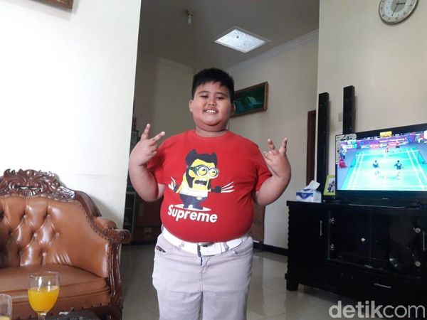 Foto: Fairel, Anak Pramuka yang Melongo Lihat Jokowi Naik Moge