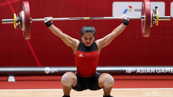 Sri Wahyuni Persembahkan Perak Angkat Besi Putri