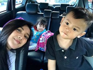 Raya Kitty, Pembalap Cantik yang Sayang Keponakan Raya Kitty, Pembalap Cantik yang Sayang Keponakan