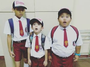 Potret Fairel, Bocah Pramuka yang Melongo Lihat Jokowi Naik Moge