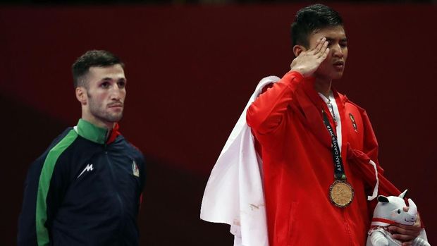 Rifki Ardhiansyah merebut medali emas Asian Games 2018.