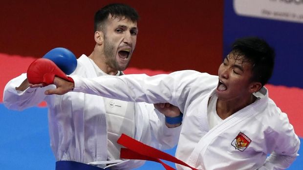 Rifki Ardhiansyah mengalahkan wakil Iran di final kumite 60 kilogram.