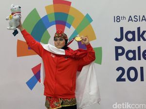 Puspa Arumsari Persembahkan Emas Pertama Pencak Silat untuk Pelatih Puspa Arumsari Persembahkan Emas Pertama Pencak Silat untuk Pelatih