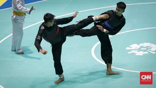 Komang Harik Adi Putra ketika mengalahkan Mohd Al Jufferi.