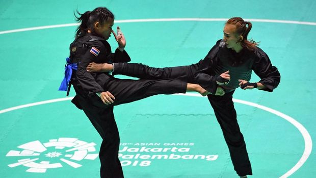 Pesilat Wewey Wita (kanan) akan tampil di kelas C putri hari ini.